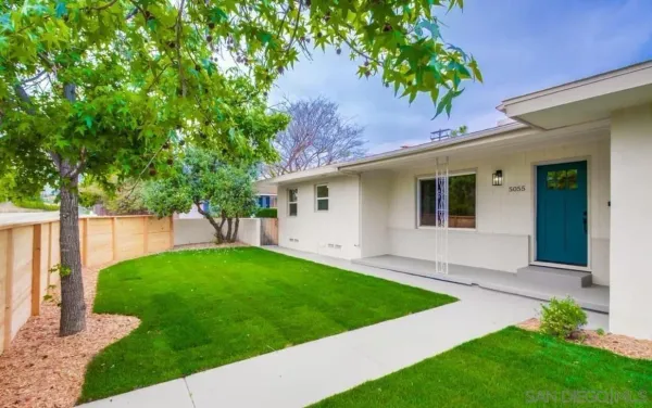 a view of a backyard with a garden