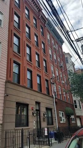 525 Adams Street, Unit 4L Hoboken, NJ 07030 - Photo 2 of 7 a front view of a building