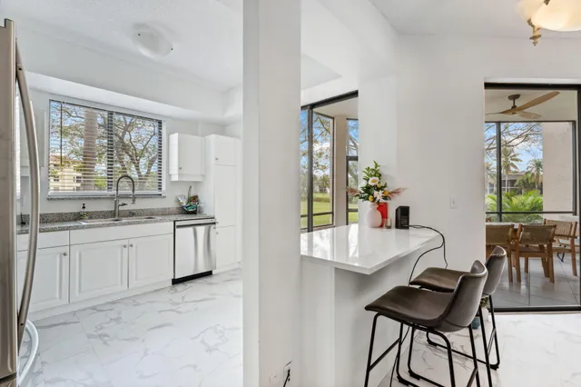 $425,000 | 7546 La Paz Boulevard, Unit 105, Boca Raton, FL 33433