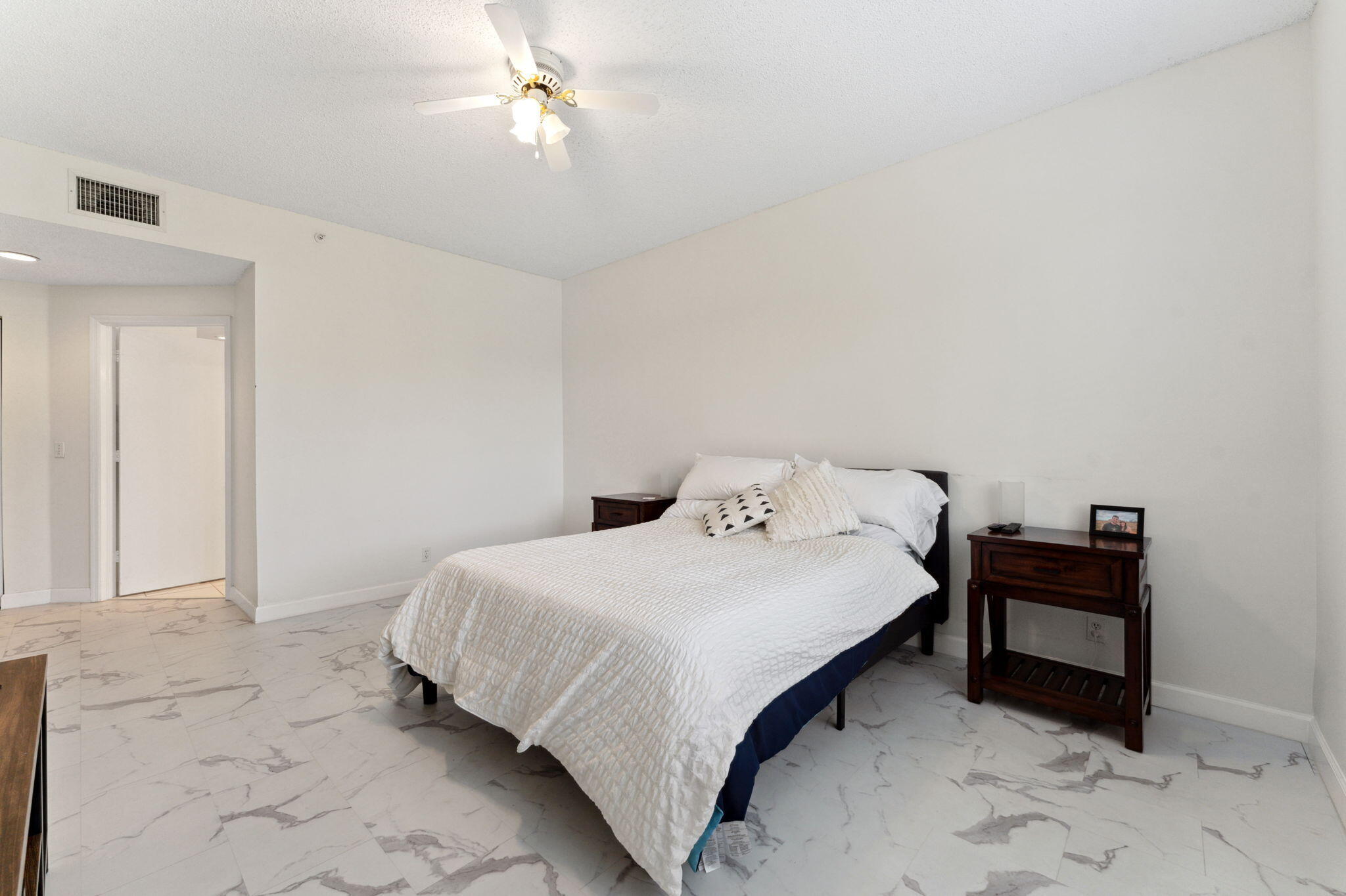 7546 La Paz Boulevard, Unit 105 Boca Raton, FL 33433 - Photo 19 of 29 Primary Bedroom