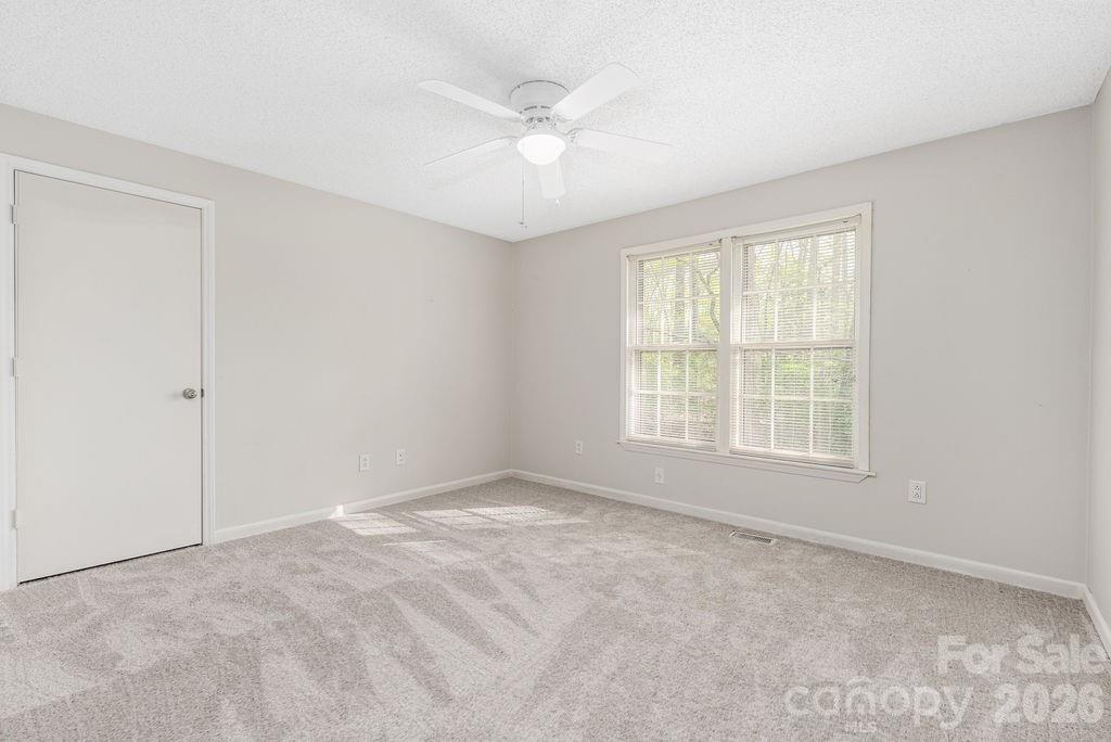 349 Lake Wylie Road Belmont, NC 28012 - Photo 19 of 48 a view of an empty room with a window
