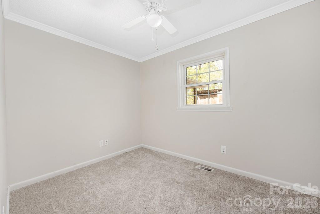 349 Lake Wylie Road Belmont, NC 28012 - Photo 22 of 48 an empty room with a window