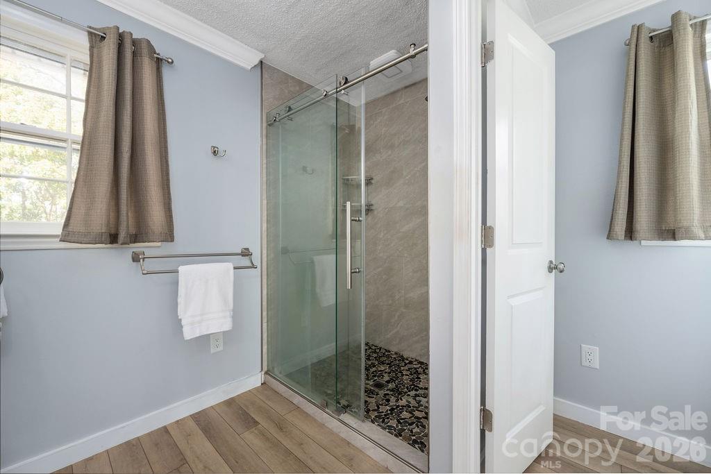 349 Lake Wylie Road Belmont, NC 28012 - Photo 29 of 48 a bathroom with a shower and a sink