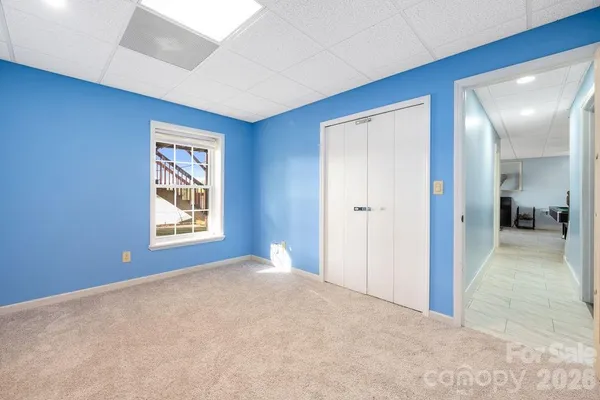 a view of a livingroom with a staircase