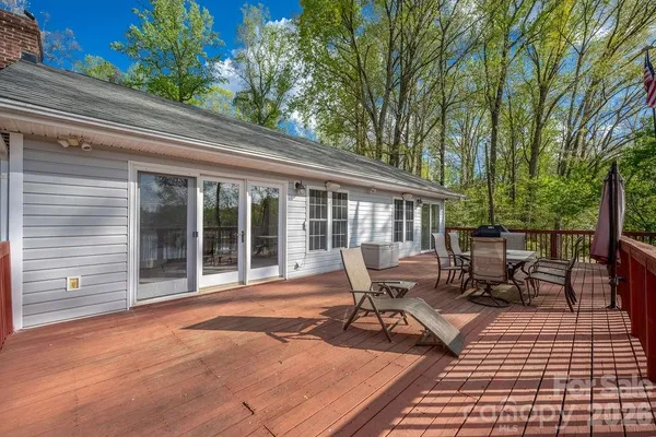 a bench sitting in front of a house