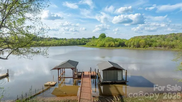 a front view of a house with lake view