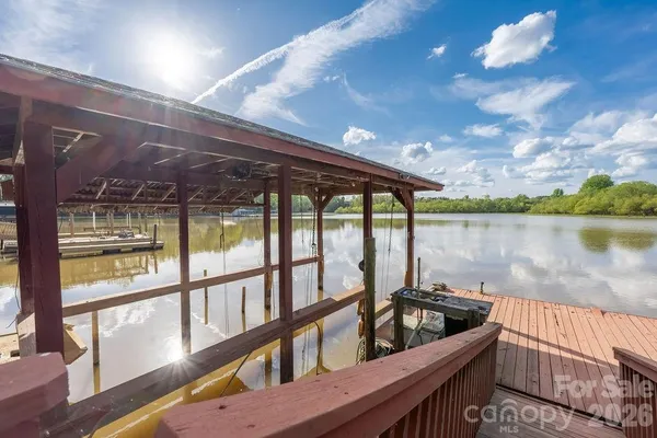 a view of swimming pool from a balcony