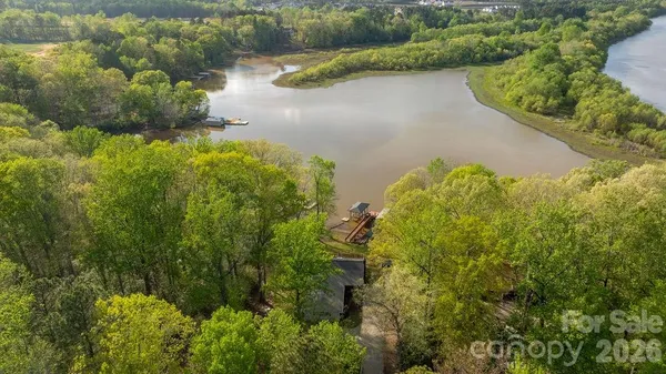 a view of a lake with a yard