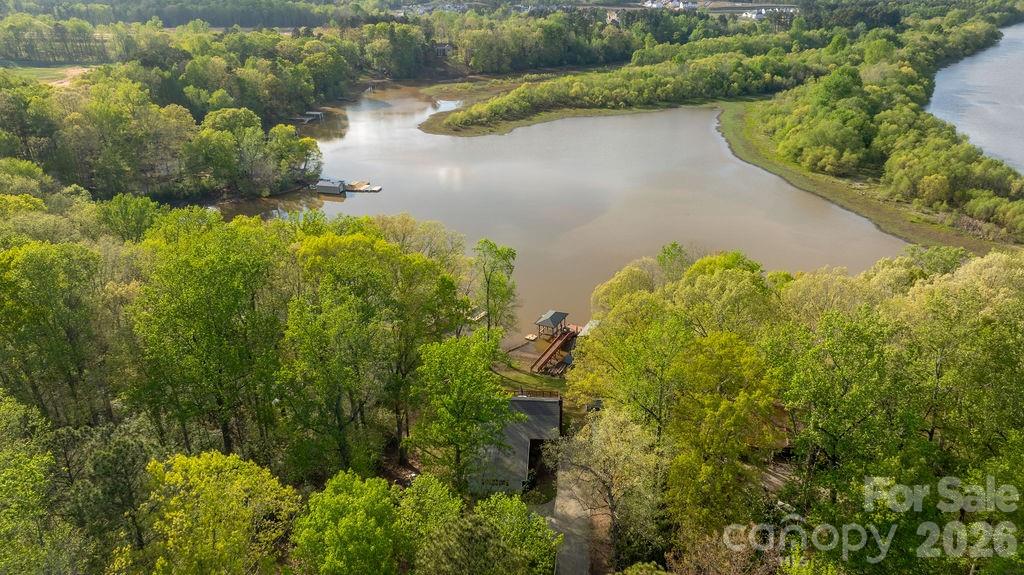 349 Lake Wylie Road Belmont, NC 28012 - Photo 6 of 48 a view of a lake with a yard