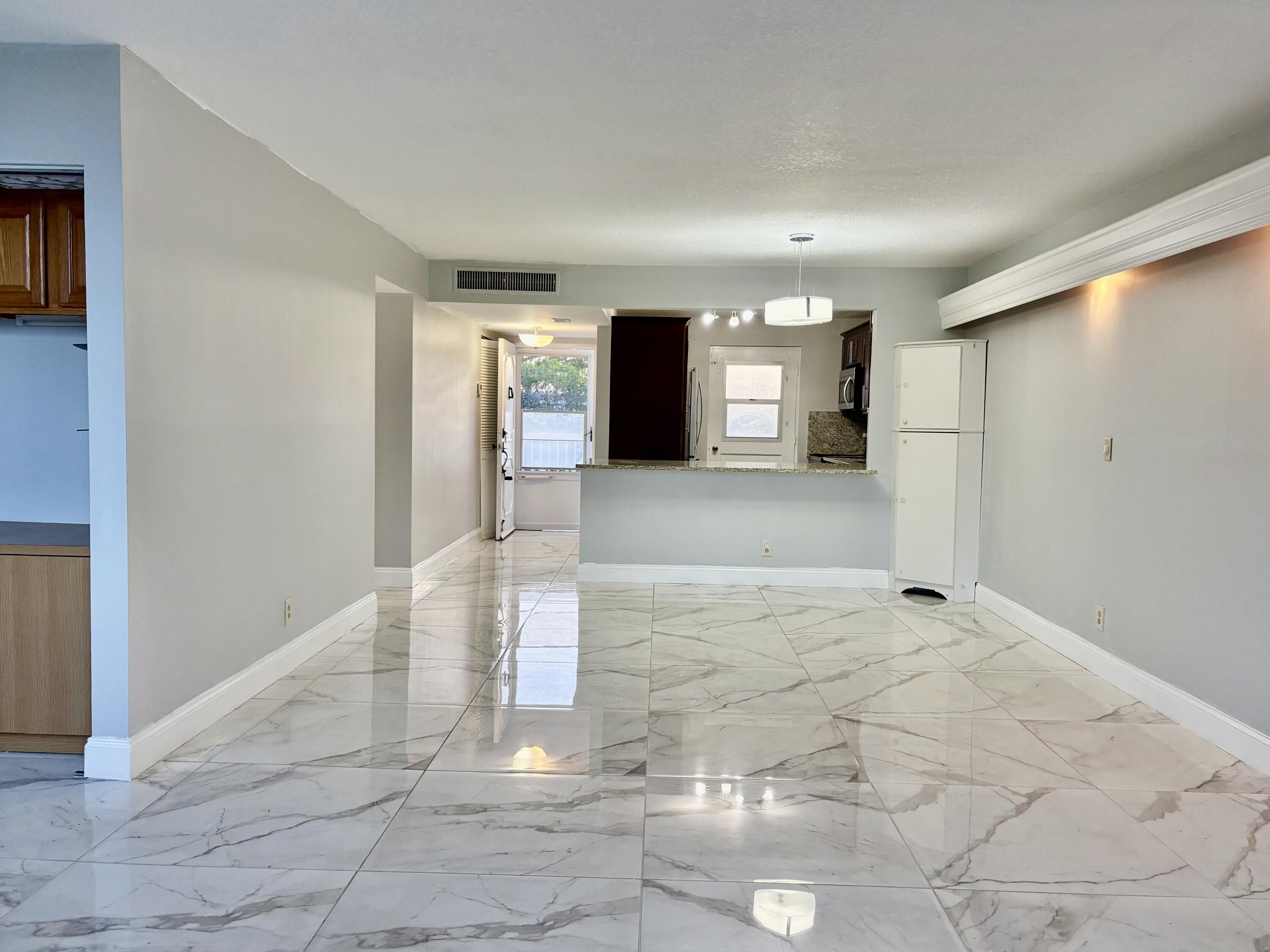 5700 Northwest 2nd Avenue, Unit 311 Boca Raton, FL 33487 - Photo 9 of 33 LIVING ROOM
