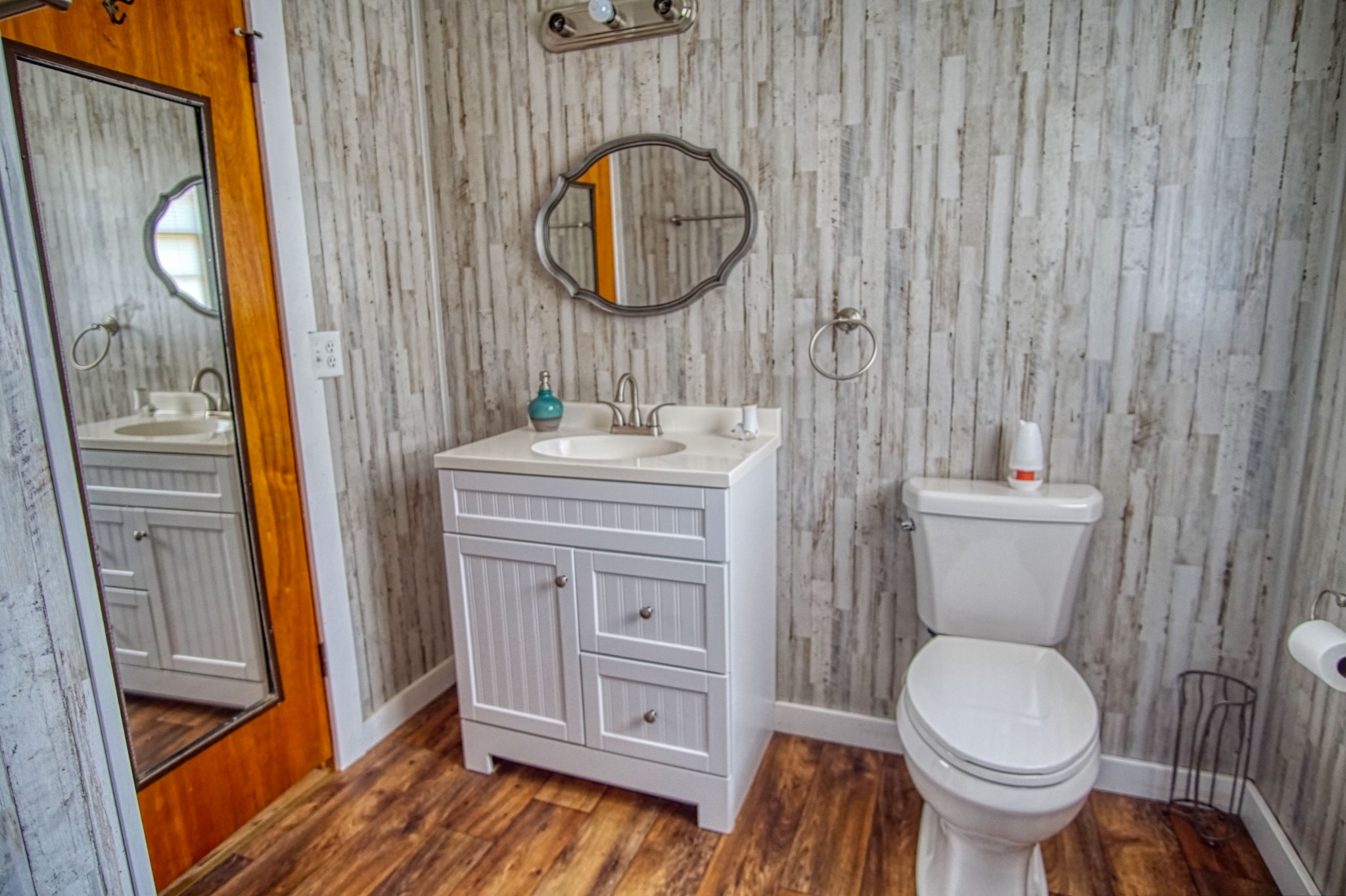 269 Patrick Road Fayetteville, TN 37334 - Photo 5 of 14 a bathroom with a toilet a sink and a mirror