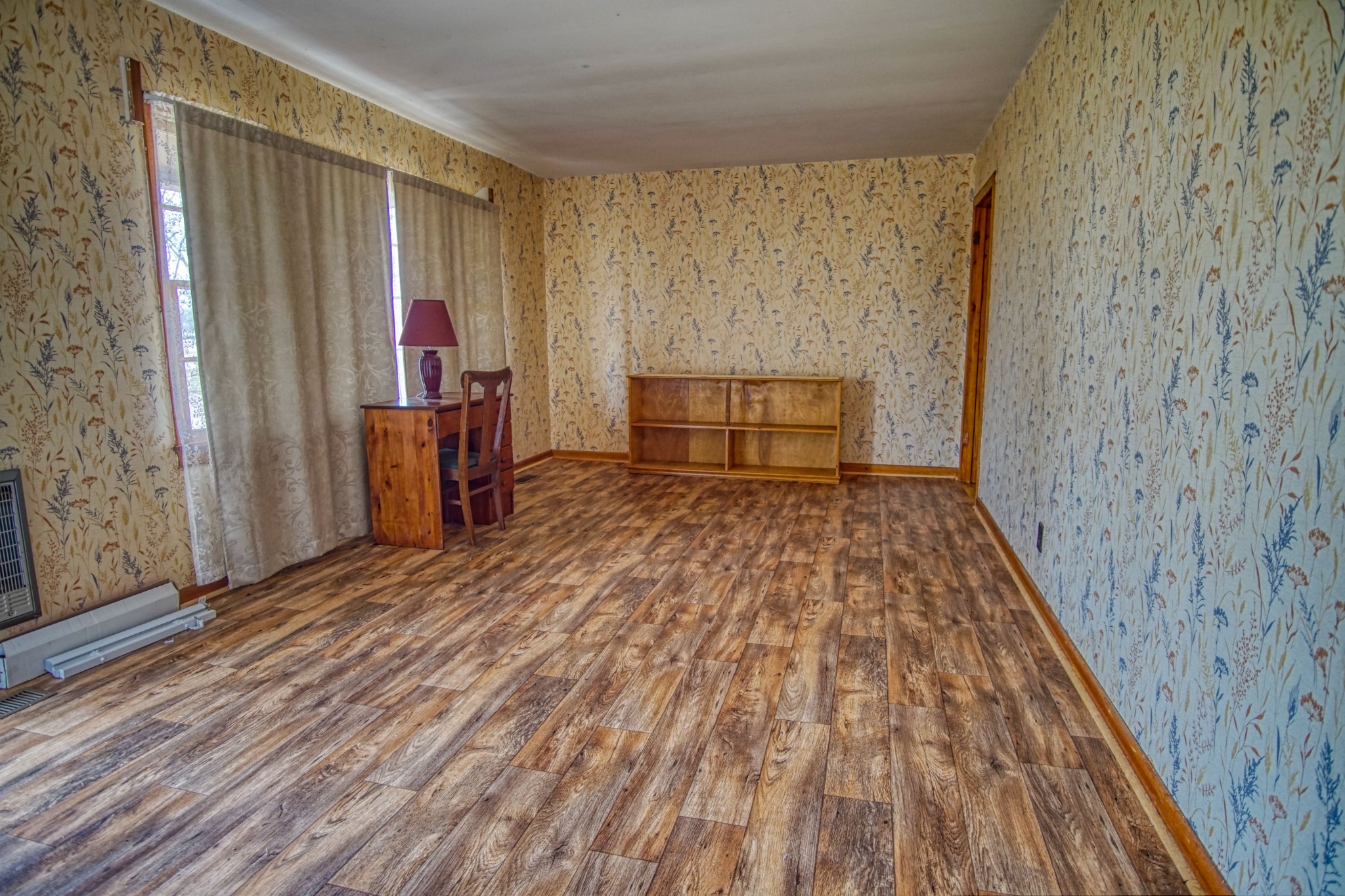269 Patrick Road Fayetteville, TN 37334 - Photo 8 of 14 a view of empty room with wooden floor and fan