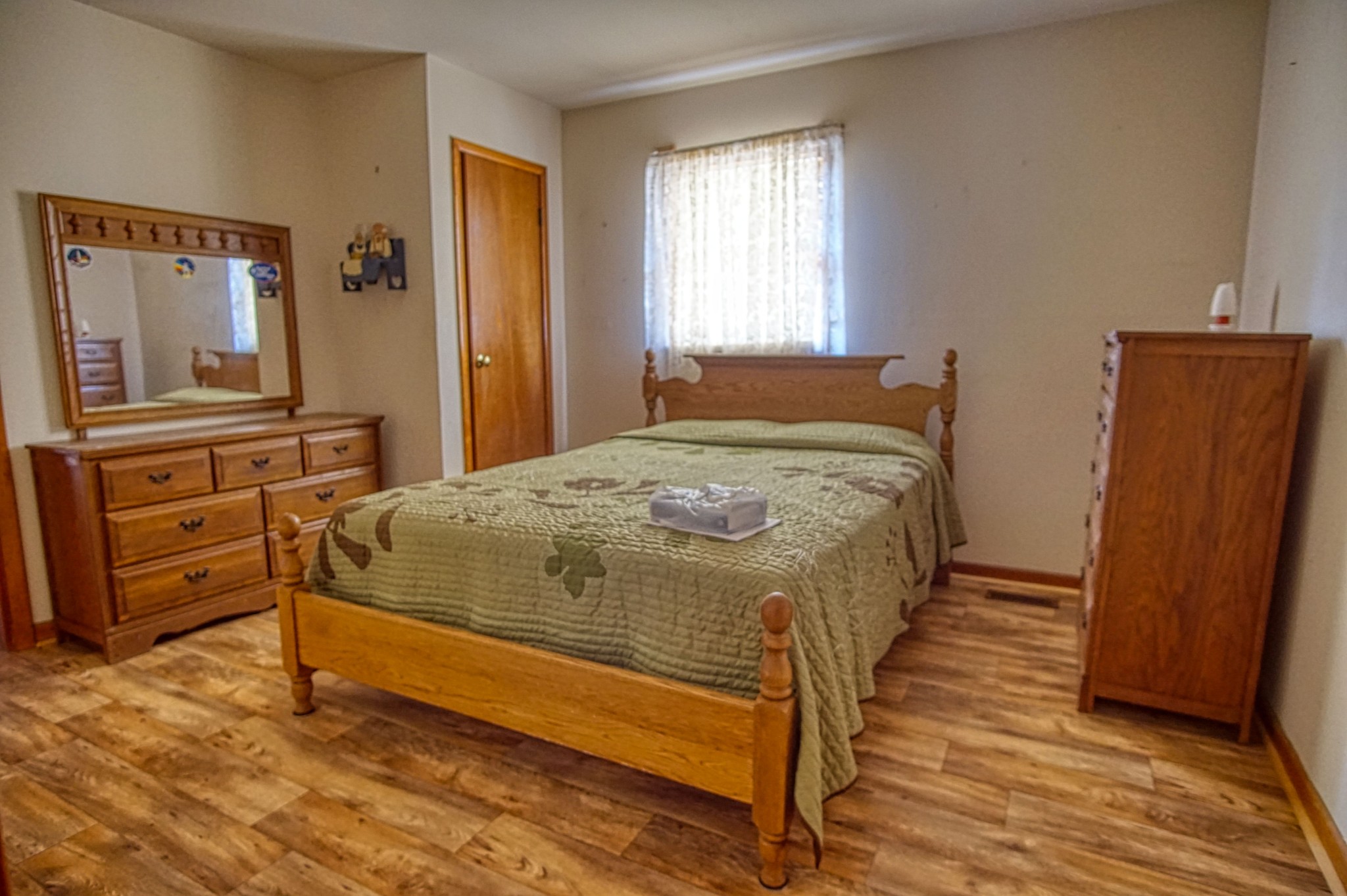 269 Patrick Road Fayetteville, TN 37334 - Photo 9 of 14 a large bed sitting in a bedroom next to a window