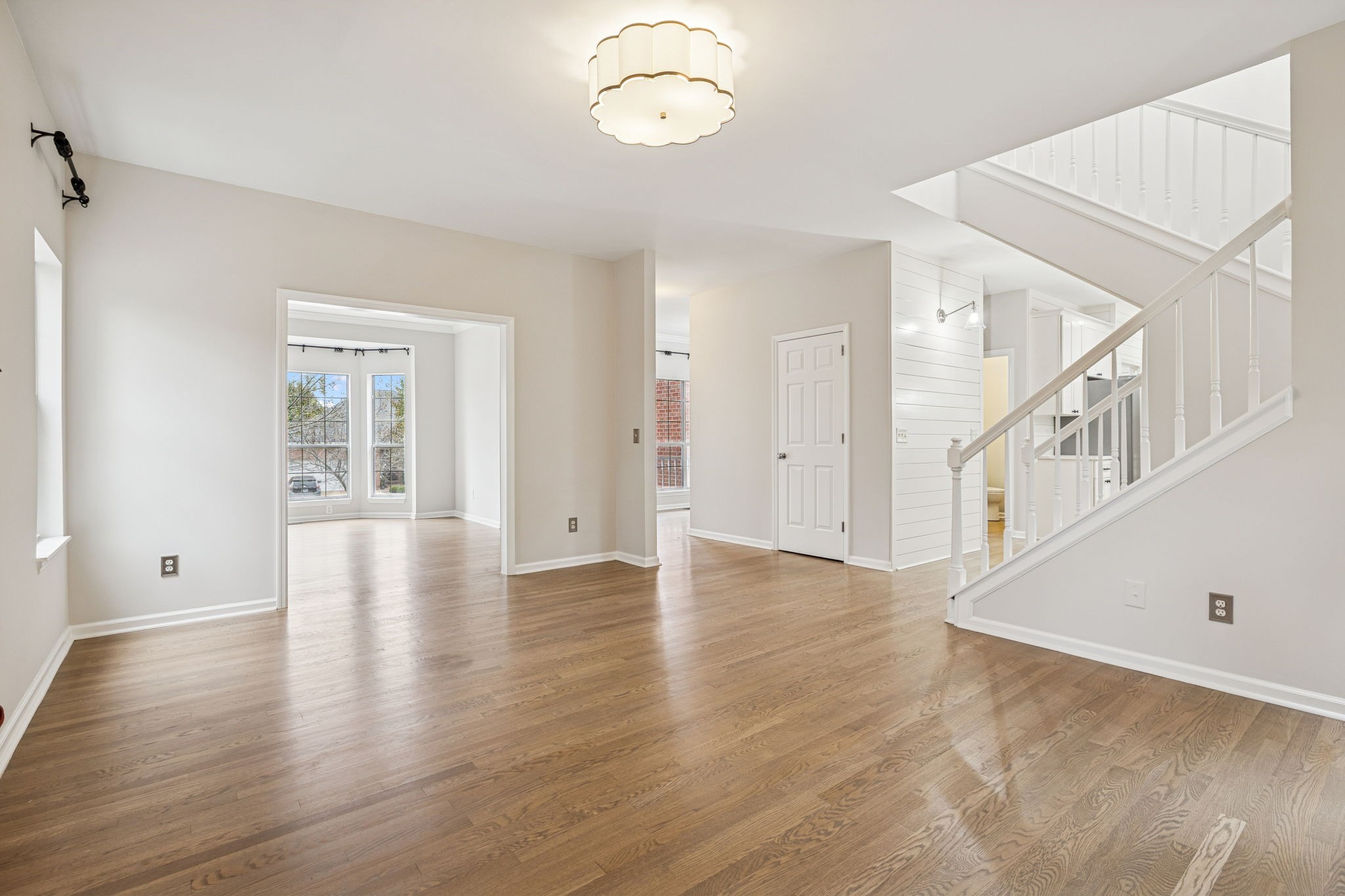 5244 Beech Ridge Road Nashville, TN 37221 - Photo 16 of 77 an empty room with wooden floor and windows