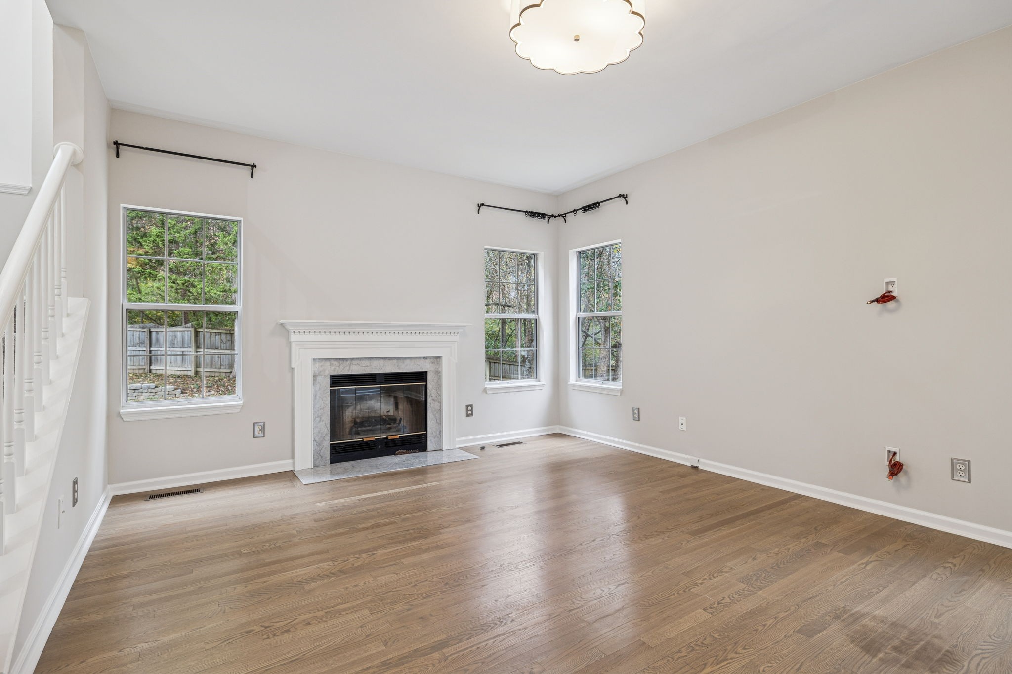 5244 Beech Ridge Road Nashville, TN 37221 - Photo 18 of 77 a view of an empty room with wooden floor and a window