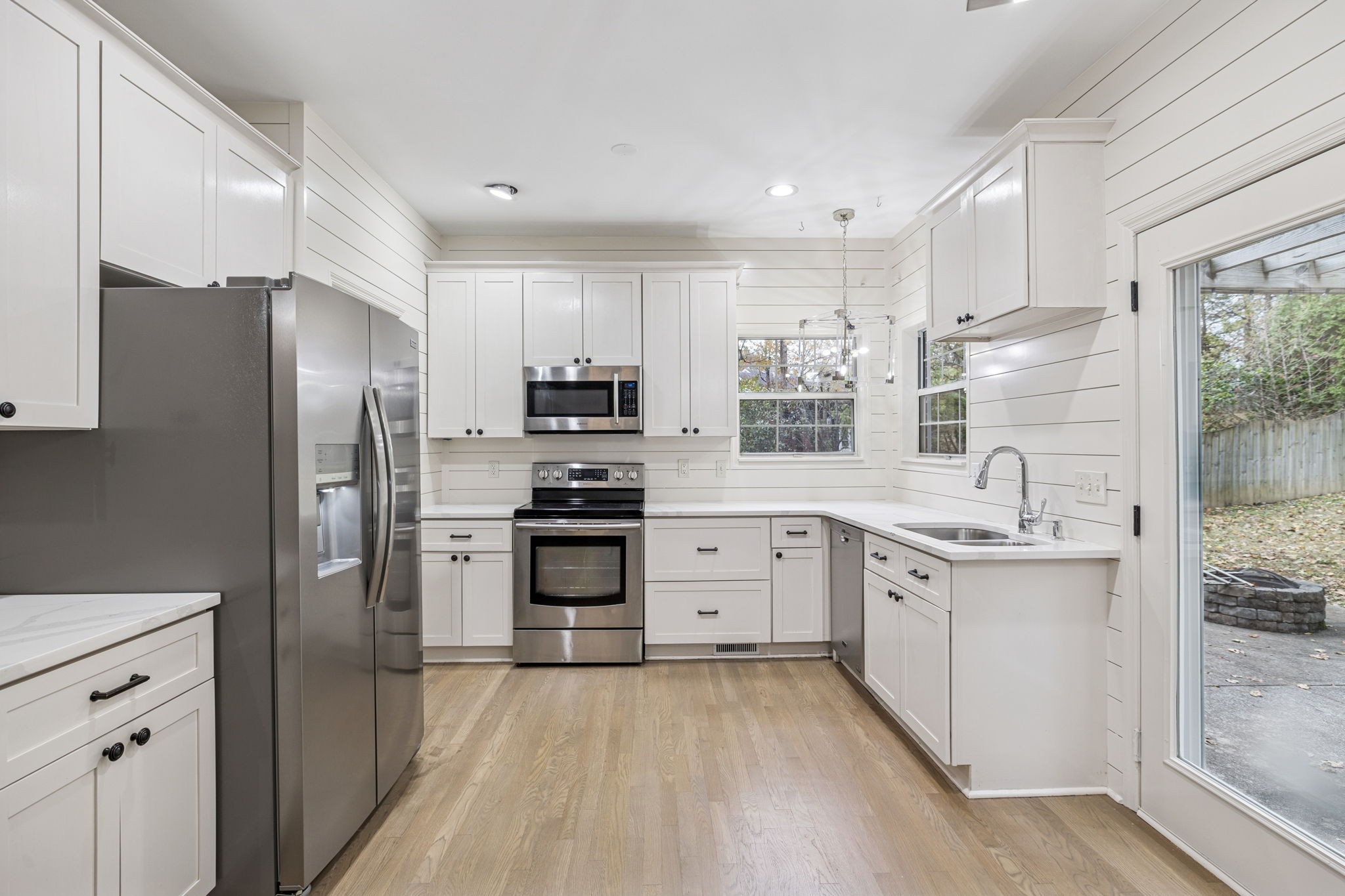 5244 Beech Ridge Road Nashville, TN 37221 - Photo 22 of 77 a kitchen with stainless steel appliances a refrigerator sink and microwave