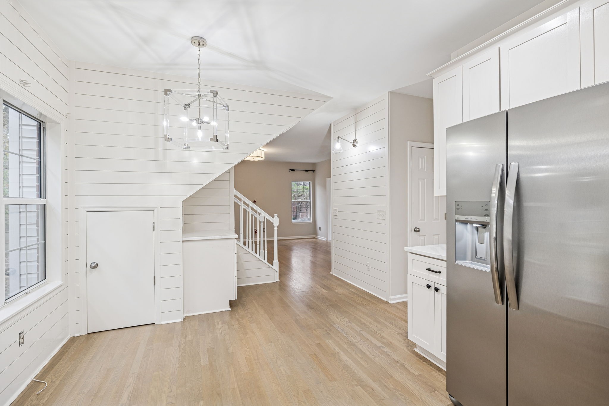 5244 Beech Ridge Road Nashville, TN 37221 - Photo 25 of 77 a view of a hallway with wooden floor and staircase