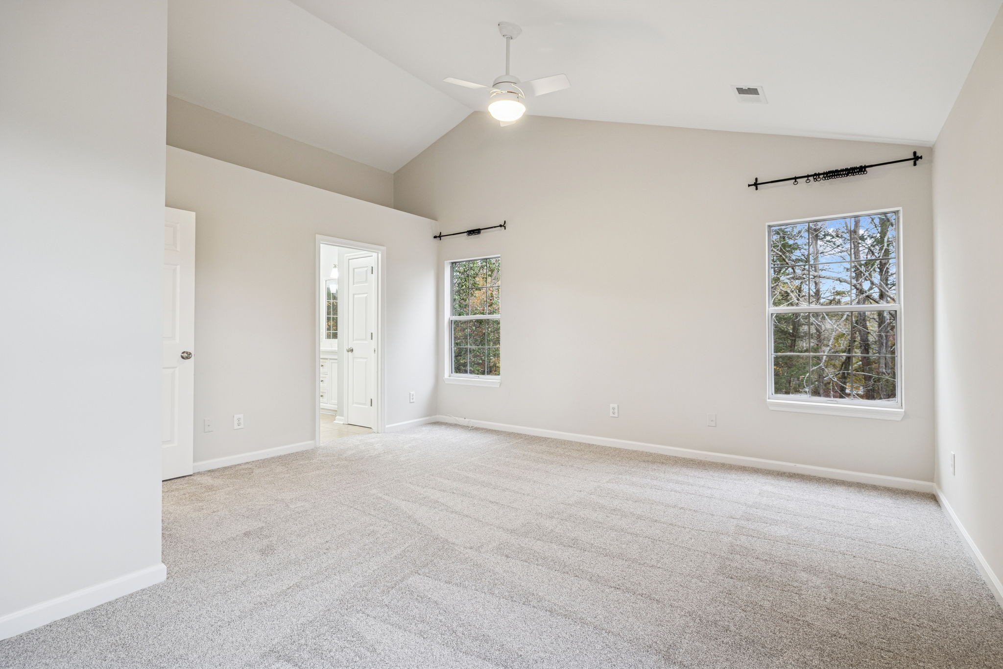 5244 Beech Ridge Road Nashville, TN 37221 - Photo 35 of 77 an empty room with windows and fan