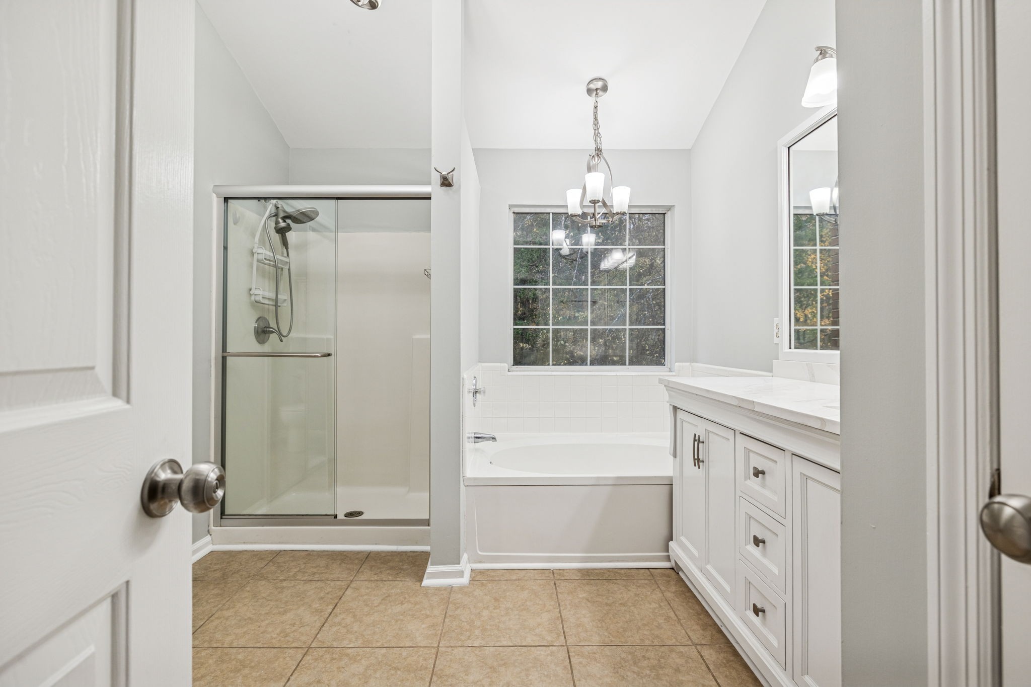 5244 Beech Ridge Road Nashville, TN 37221 - Photo 36 of 77 a bathroom with a tub shower and sink