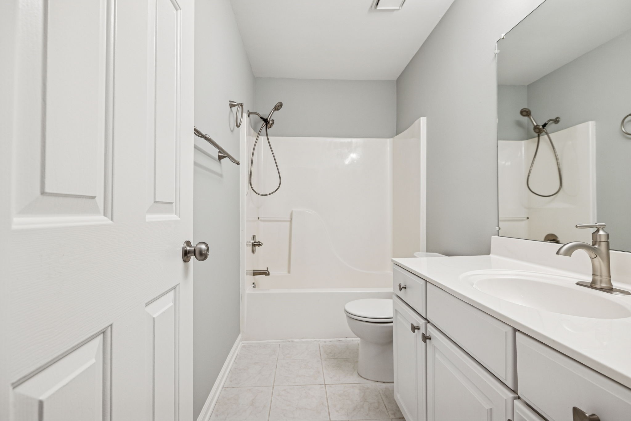 5244 Beech Ridge Road Nashville, TN 37221 - Photo 43 of 77 a bathroom with a granite countertop sink a toilet and shower