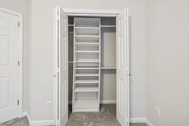 a view of backyard with green space