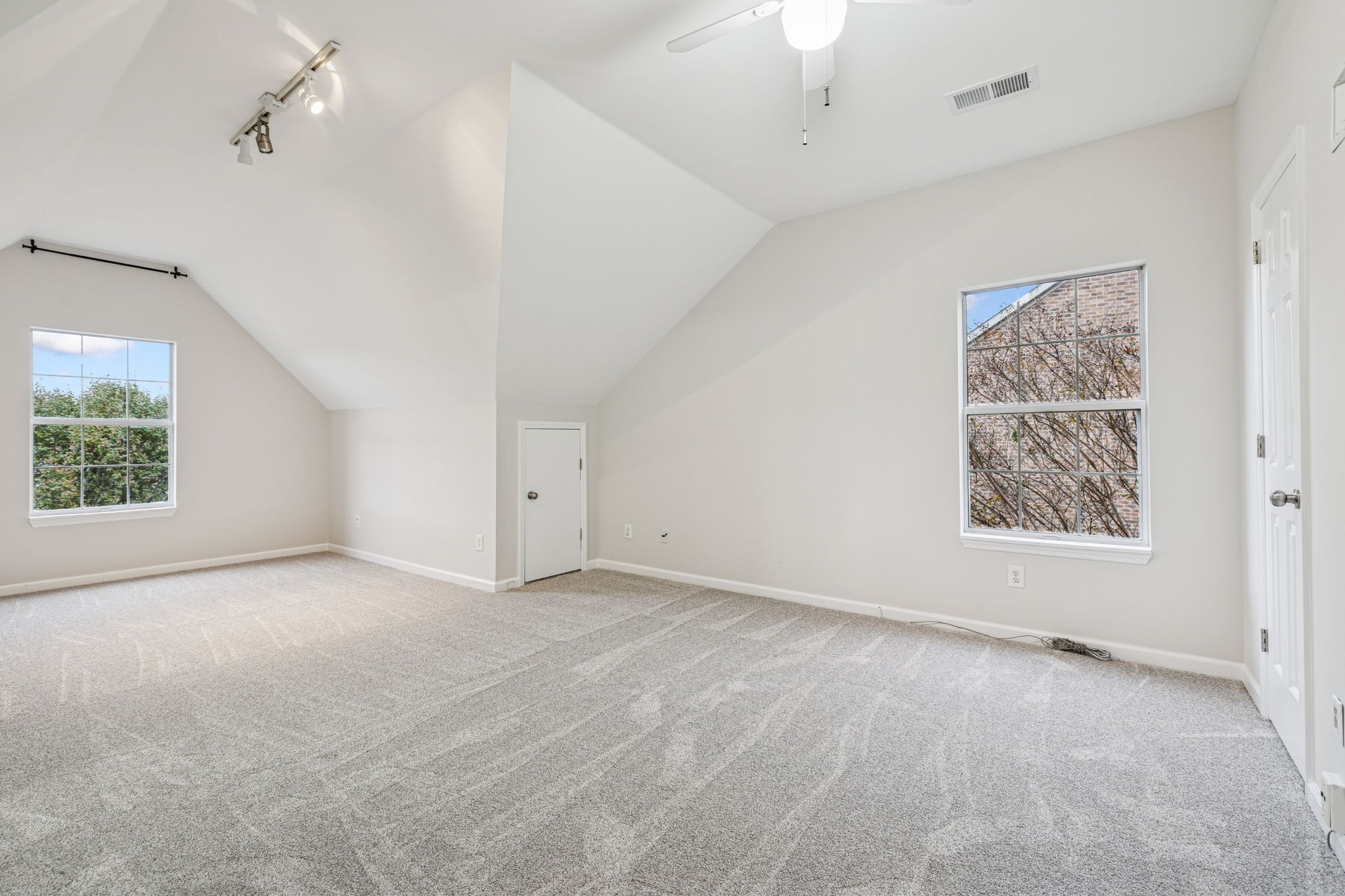 5244 Beech Ridge Road Nashville, TN 37221 - Photo 49 of 77 an empty room with windows and closet