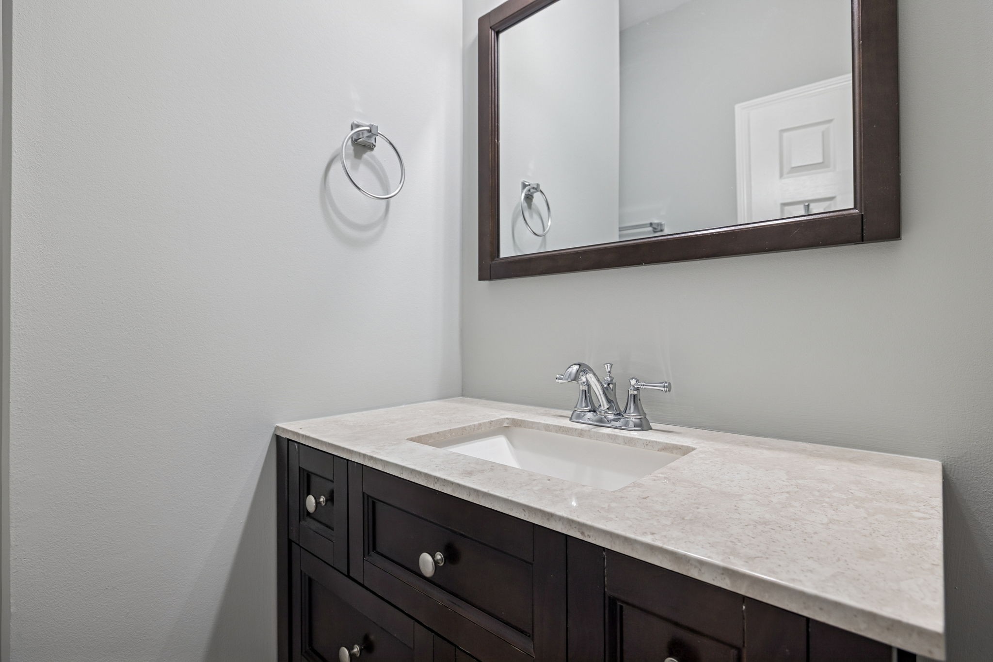 5244 Beech Ridge Road Nashville, TN 37221 - Photo 54 of 77 a bathroom with a granite countertop sink and a mirror
