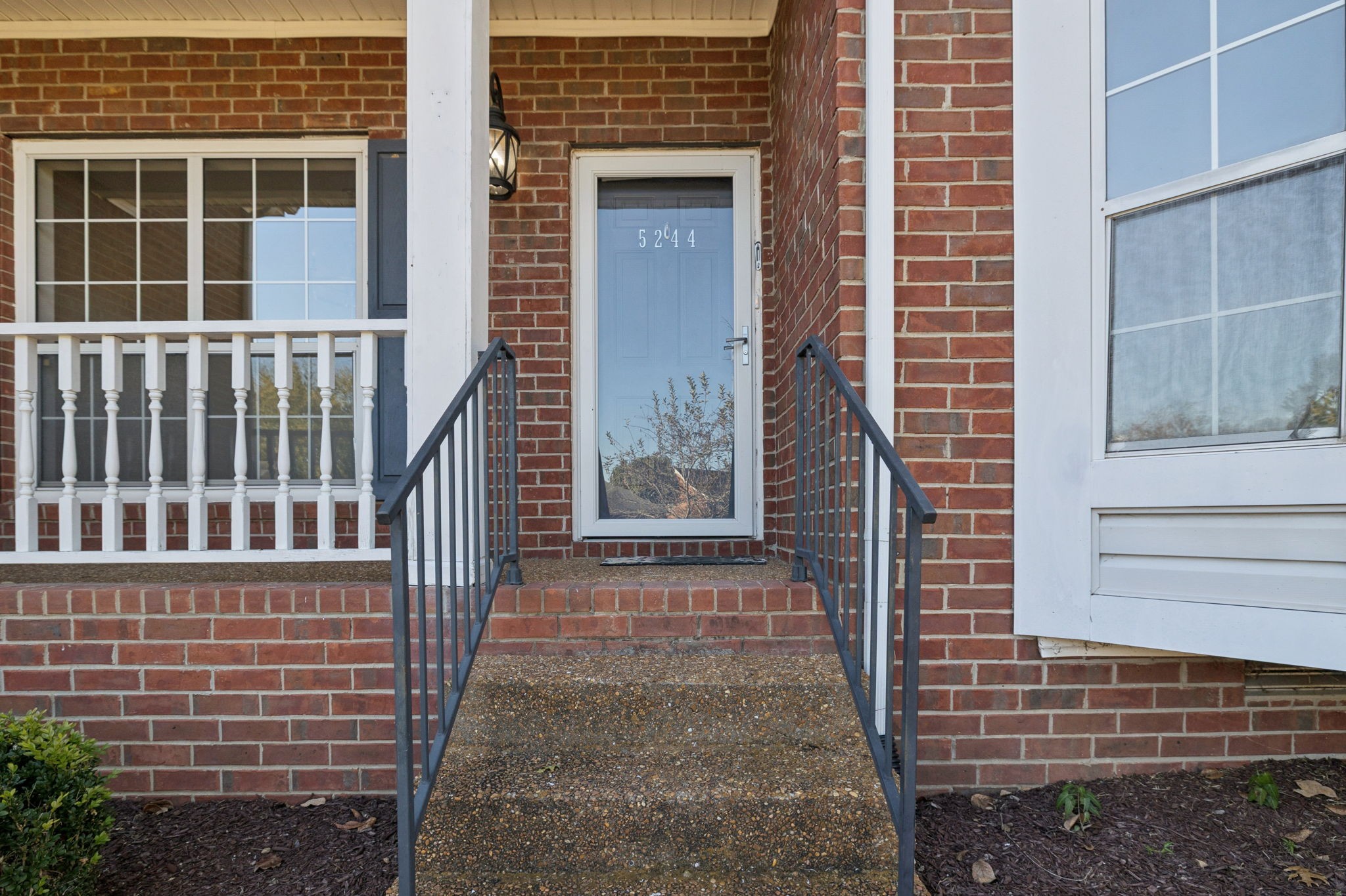 5244 Beech Ridge Road Nashville, TN 37221 - Photo 7 of 77 a view of front door of house with stairs