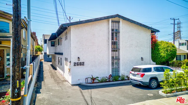 a car parked in front of a house