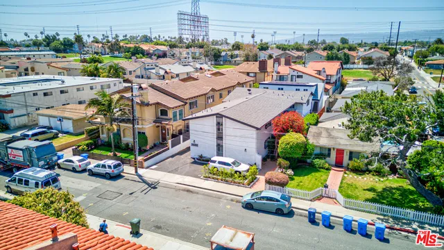 an aerial view of a city with lots of residential buildings
