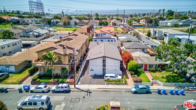 an aerial view of a city with lots of residential buildings