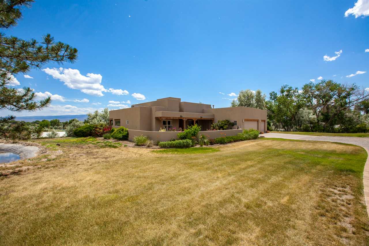 2573 I Road Grand Junction, CO 81505 - Photo 1 of 42 a view of a house with a yard