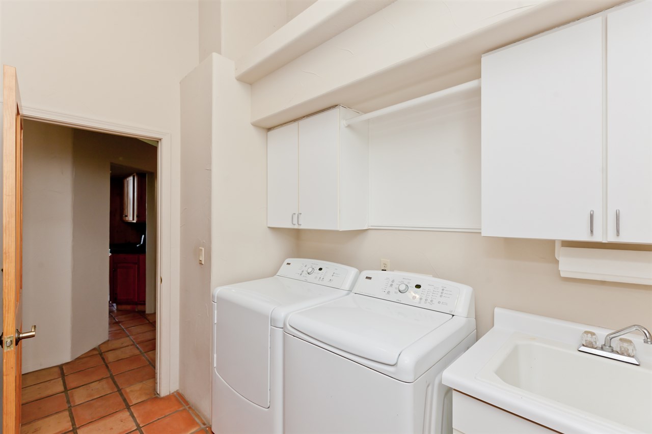 2573 I Road Grand Junction, CO 81505 - Photo 32 of 42 a view of storage and utility room with washer and dryer