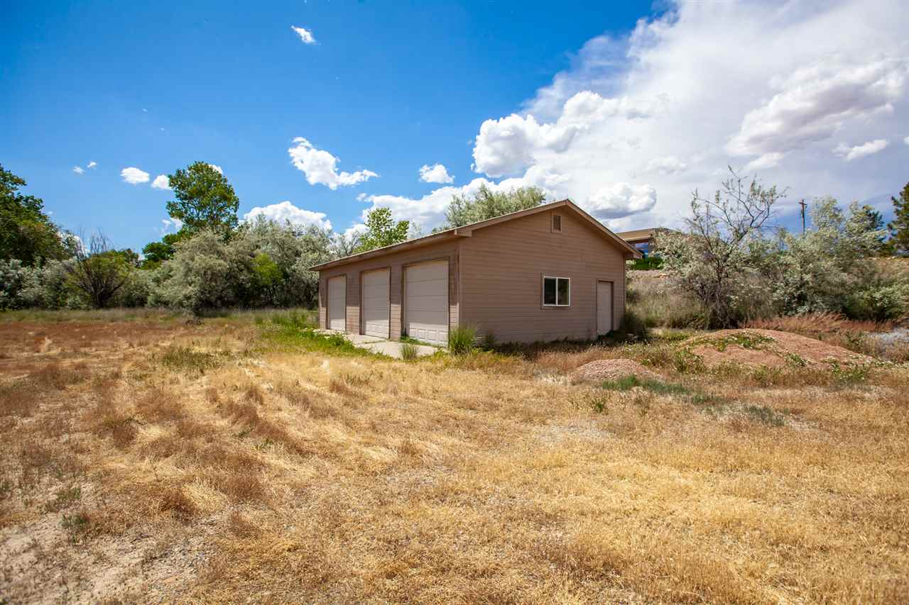 2573 I Road Grand Junction, CO 81505 - Photo 41 of 42 a view of a house with a backyard