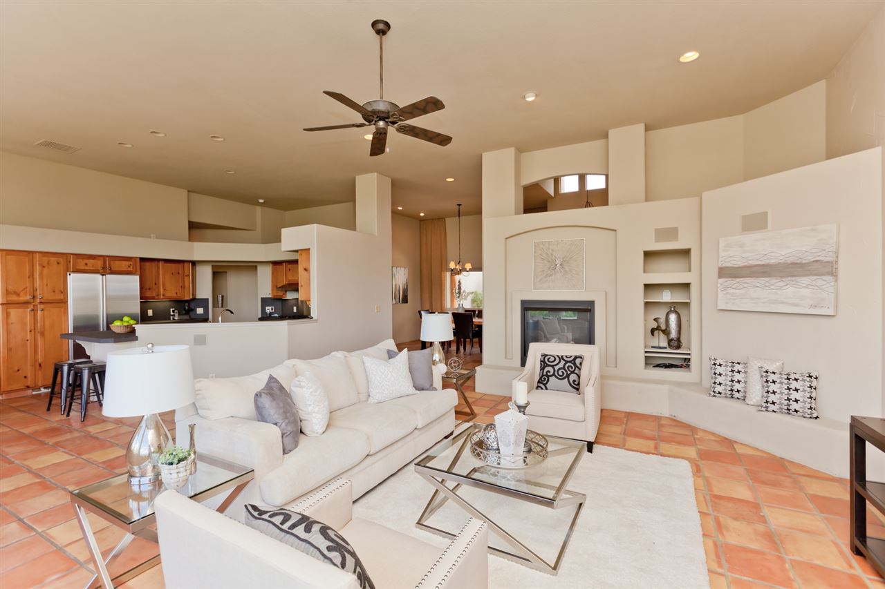 2573 I Road Grand Junction, CO 81505 - Photo 5 of 42 a living room with furniture and a fireplace