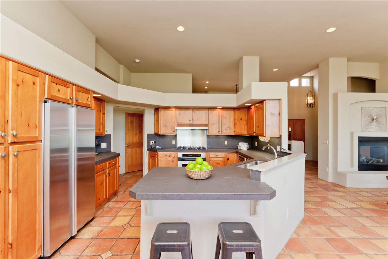 2573 I Road Grand Junction, CO 81505 - Photo 6 of 42 a kitchen with a sink a counter top space and stainless steel appliances