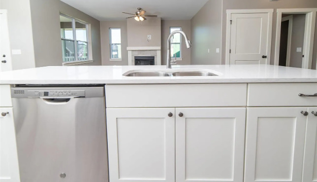 7235 Genesis Way Bettendorf, IA 52722 - Photo 13 of 26 a bathroom with a sink and a mirror