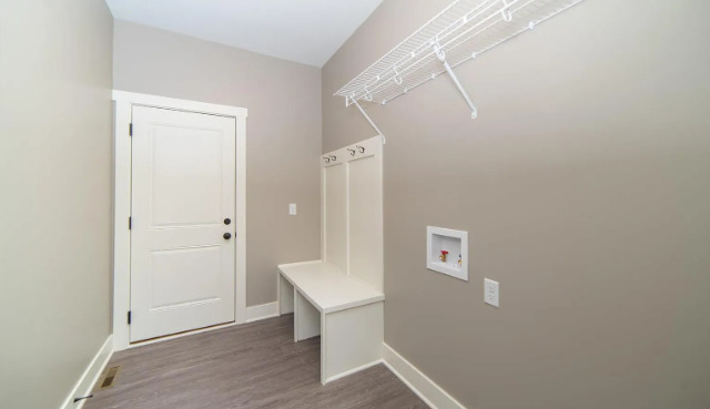 7235 Genesis Way Bettendorf, IA 52722 - Photo 2 of 26 a view of a hallway with seating area