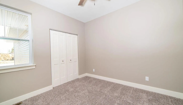 7235 Genesis Way Bettendorf, IA 52722 - Photo 21 of 26 an empty room with a window