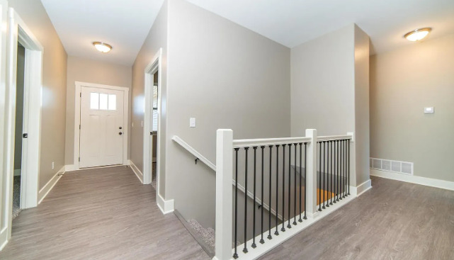 7235 Genesis Way Bettendorf, IA 52722 - Photo 23 of 26 a view of a hallway with a hallway