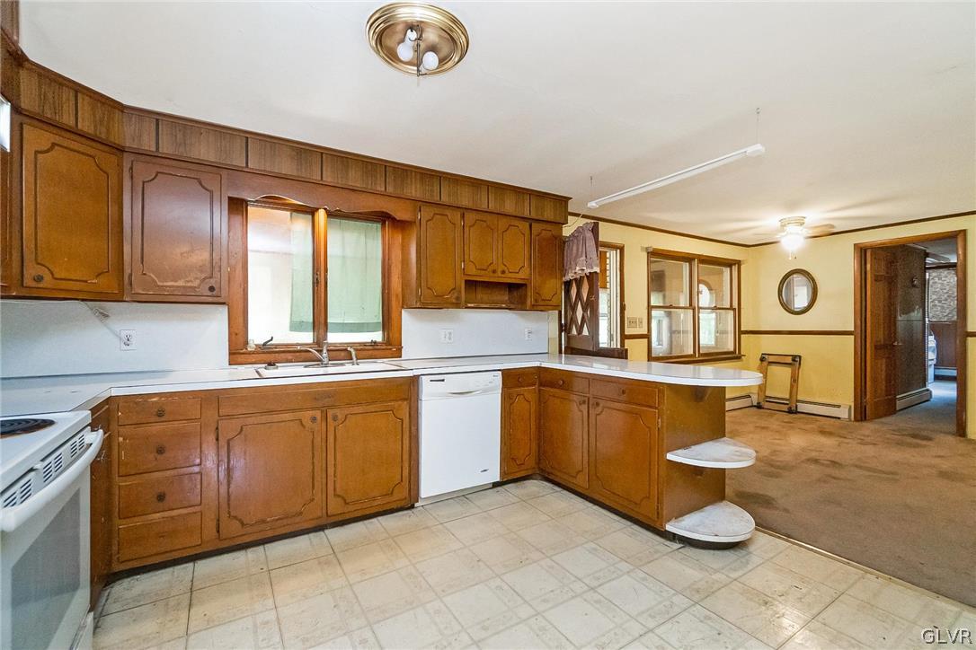 447 Hahn Road Nazareth, PA 18064 - Photo 8 of 25 a kitchen with a sink and cabinets