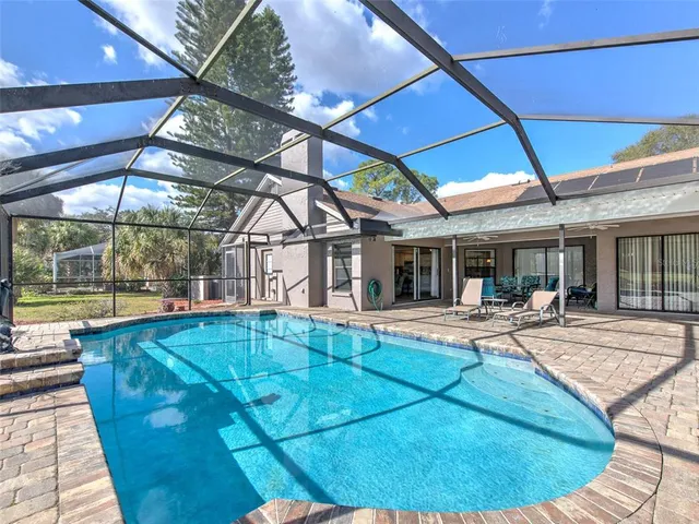 a view of a house with swimming pool
