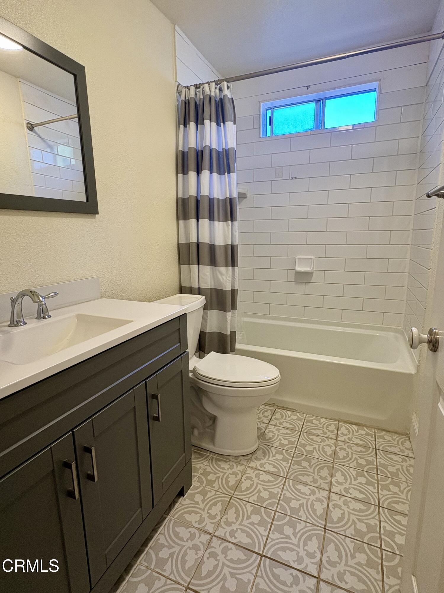 133 Prospect Street Oak View, CA 93022 - Photo 11 of 19 a bathroom with a sink a toilet and shower