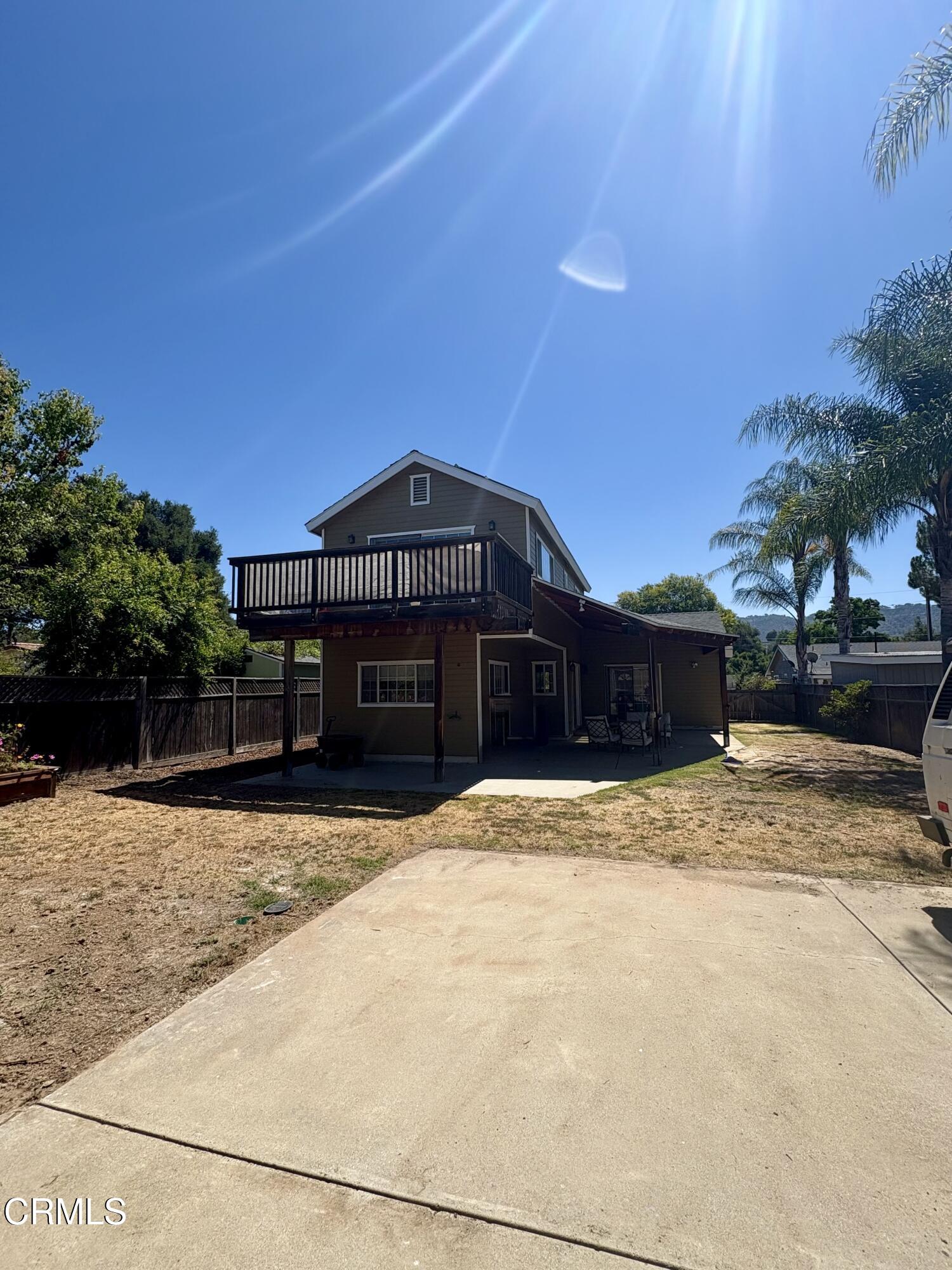 133 Prospect Street Oak View, CA 93022 - Photo 16 of 19 a view of a house with a yard