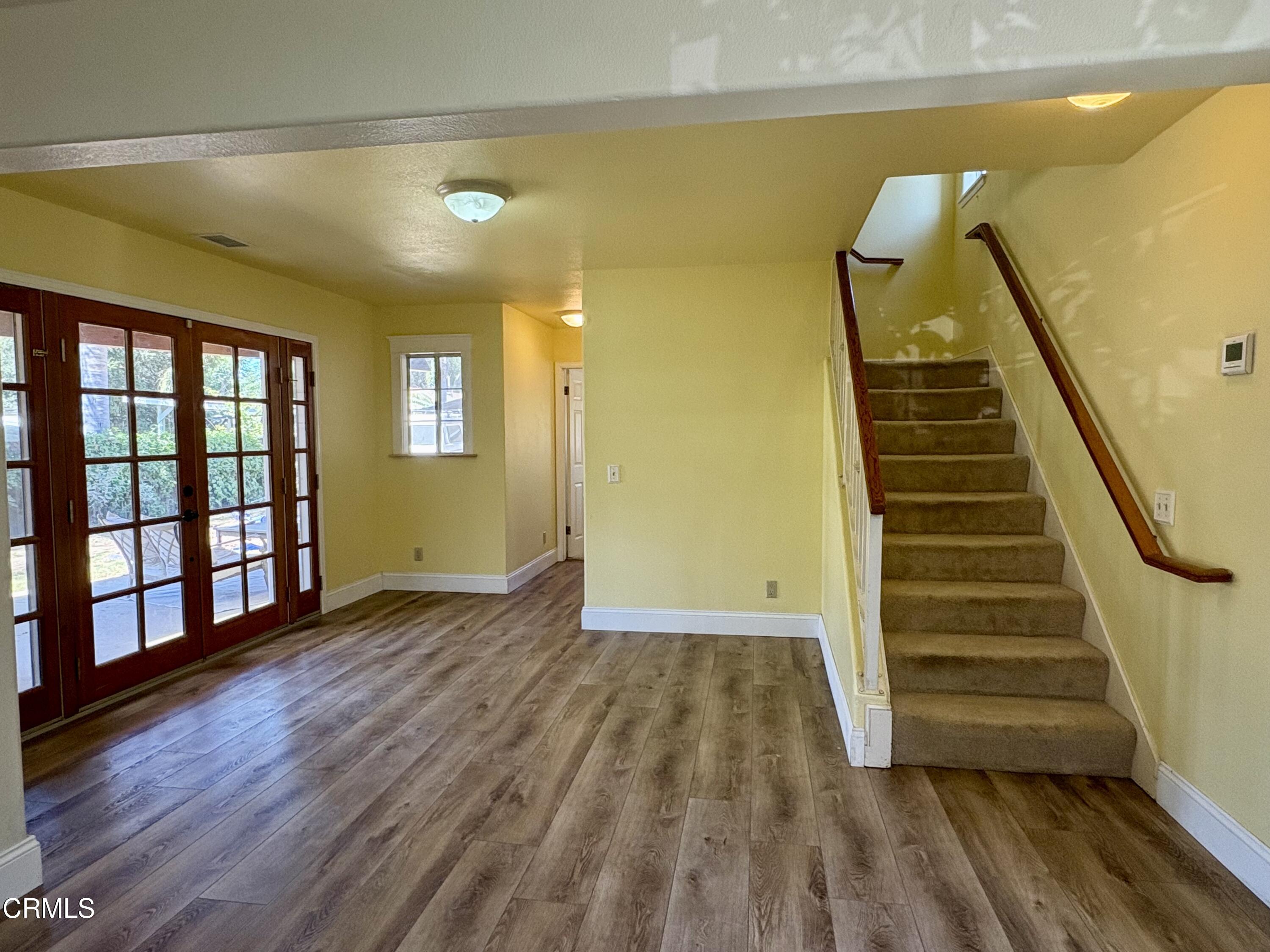 133 Prospect Street Oak View, CA 93022 - Photo 9 of 19 a view of an entryway with wooden floor