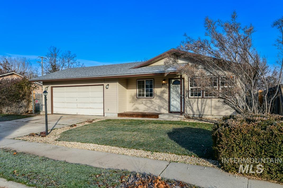 480 Easy Street Kuna, ID 83634 - Photo 3 of 39 Ranch-style house with driveway, a front lawn, a shingled roof, and a garage