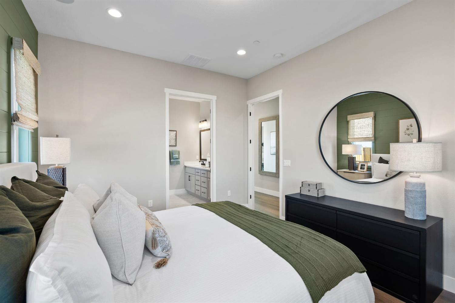 1838 Foster Lane Davis, CA 95616 - Photo 22 of 56 a bedroom with a bed and a mirror