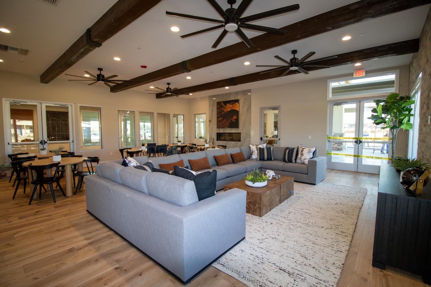 1838 Foster Lane Davis, CA 95616 - Photo 42 of 56 a living room with furniture kitchen view and a wooden floor