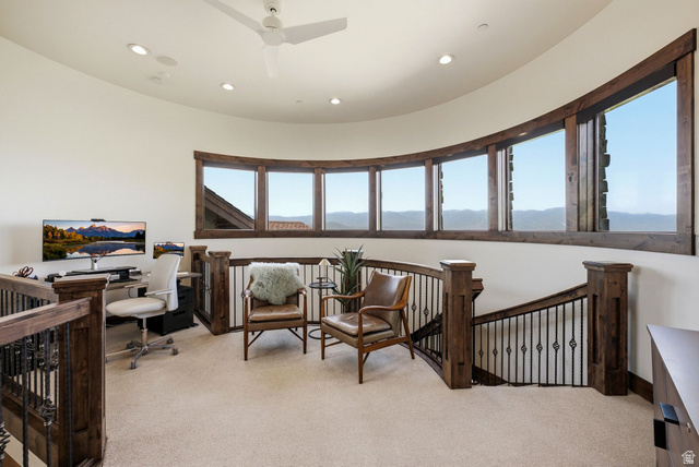 7885 North Rabbitbrush Court, Unit 13 Park City, UT 84098 - Photo 59 of 88 Curved wall with a full bank of windows, offering expansive outdoor scenery