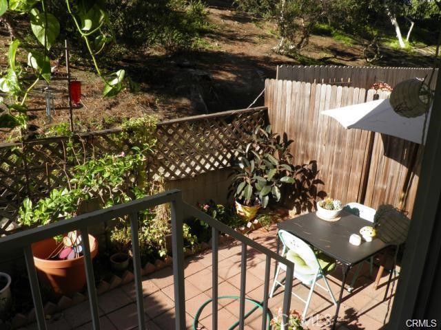 25006 Terrace Lantern Dana Point, CA 92629 - Photo 6 of 8 Your own patio yard area under the tall pines.